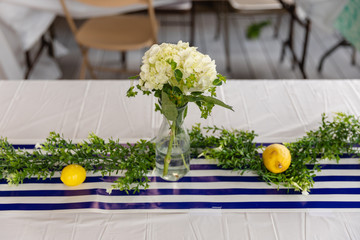 Flowers and table decor for summertime backyard wedding