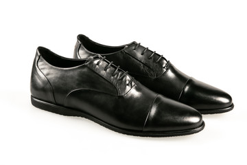 black leather shoes isolated on white background