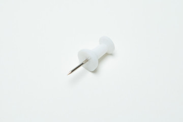 Close up of White pin  on white background
