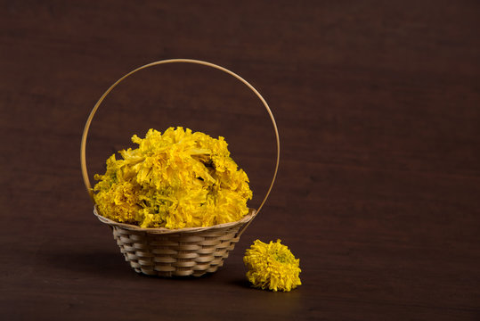 Marigold (Zendu Flowers) flowers in a bamboo basket.