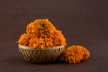 Marigold (Zendu Flowers) flowers in a bamboo basket.
