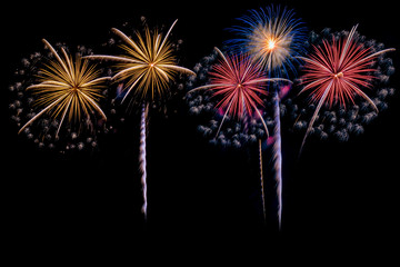 The colorful of fireworks showing on dark sky at night time for special celebration day with black background.