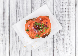 Some fresh Tomato Sandwich (selective focus; close-up shot)