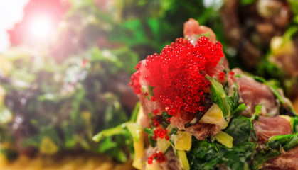 Salmon roe with sashimi and rice bowl or donburi in Japanese style food. Shrimp with rice in close-up image. Sashimi sushi in close up picture. Plate of shrimps. 