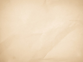 Brown recycled craft paper texture as background. Grey paper texture, Old vintage page or grunge vignette. Pattern rough art creased grunge letter. Hardboard with copy space for text.