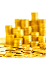 A portrait of golden coin stacking in vertical row and random set on ground