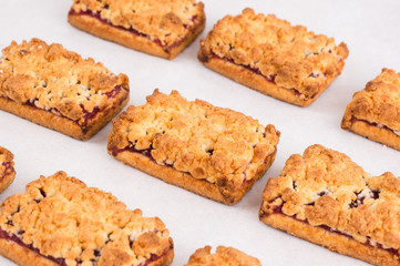 Freshly baked homemade cookies with jam in a row. Balanced nutrition, proteins and carbohydrates, cereals