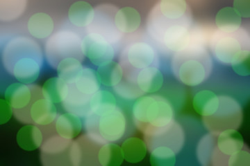 Obraz premium Christmas light bokeh and light bulbs blurred background