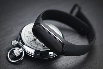 Stopwatch and fitness tracker. Sports training concept