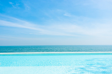 empty swimming pool with ocean sea background