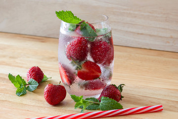 fresh Strawberry mohito cocktail with ice and mint in glass