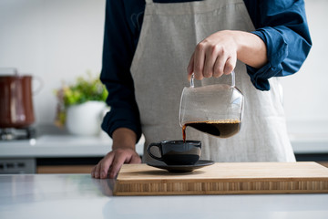 Making coffee in the kitchen
