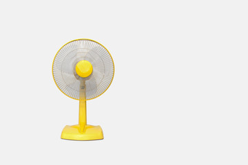 Electric Yellow table fan isolated on white background - obrazy, fototapety, plakaty