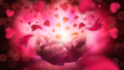 Naklejka premium Heart in the hands. Magic particles emanating from female hands. Magic particles on the palms, magic, witchcraft. Give love.
