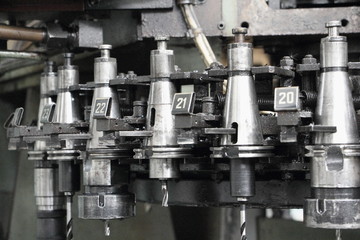 Collet instrument holders on metal-cutting machine tool close up, Metalworking tools