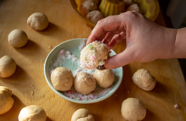 cooking homemade monkey bread with butter, sugar and caramel