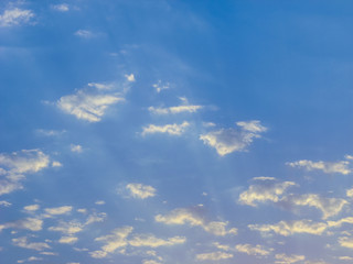 Blue sky with white cloud patches.