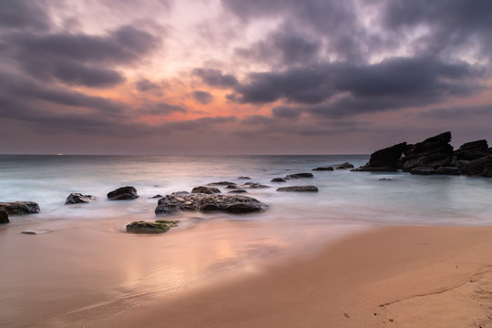 Soft Dawn Seascape with Smoky Haze and Clouds at the Seaside