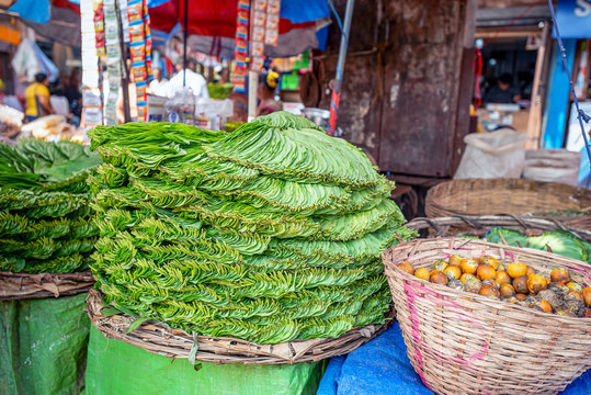 GOA, selling of Betel leaves at a market. Paan is an addictive and euphoria-inducing formulation with adverse health effects.It is chewed for its stimulant and psychoactive effects