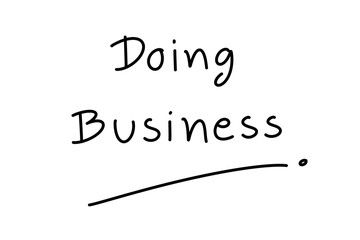 Hand writing. Black word "Doing Business" on white background. Can be use for advertising, banner.