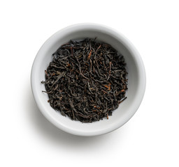 Fototapeta premium Black tea top view on white background
