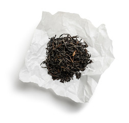 Black tea top view on white background