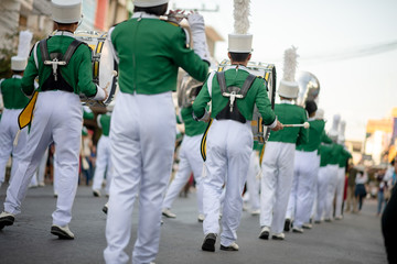 Close up and details of playing musicians, instruments in a marching, show band or music band