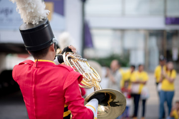 Close up and details of playing musicians, instruments in a marching, show band or music band