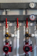 Heating system switch in the boiler room of a private house.