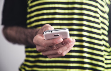 Man holding smartphone. Technology concept