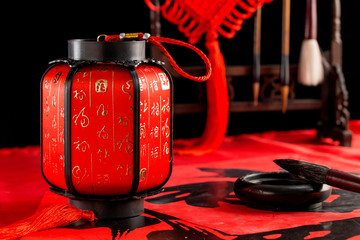 Spring Festival materials such as couplets, lanterns, pen and ink, and ingot
