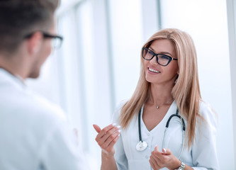 close up. woman doctor talking to colleague