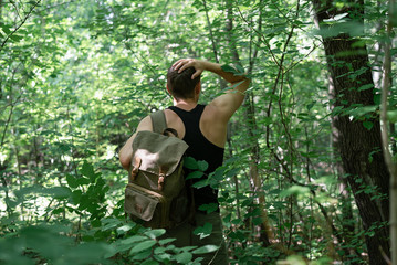 Tourist stray in a forest and is trying to find out exit.
