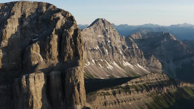 Drone reveal of beautiful mountains during sunrise in Fernie, British Columbia, Canada