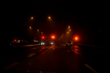 traffic light a dark and foggy night in Karlskoga Sweden