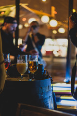 glasses of beer in a bar