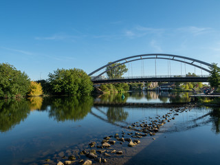Heilbronn, Germany - September 15th, 2019: Metal bridge across Neckar river, Heilbronn Germany