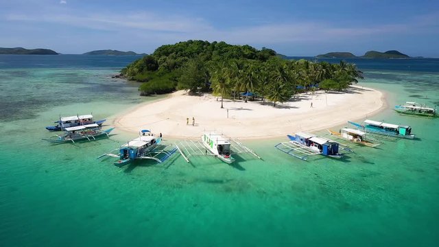 Aerial view taken with a drone of Pass Island,Busuanga,Coron,Philippines.(Panning & Rotating left)