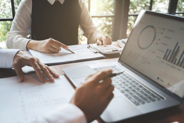 Financial analyst calculating with number documents, Investment concept.