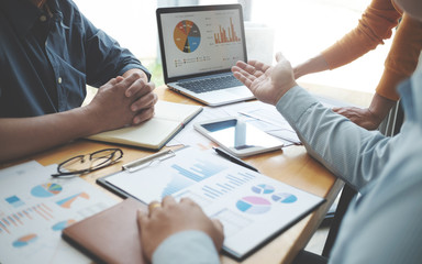 Business executive calculating a sales data perform spreadsheets.