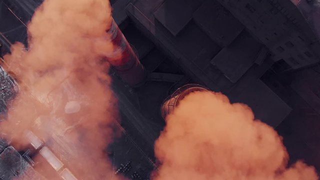 Aerial view pf industrial smokestack. Emission to atmosphere from industrial pipes, air pollution concept. Smokestack pipes shooted with drone.