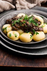 Potato dumplings and forest mushroom sauce