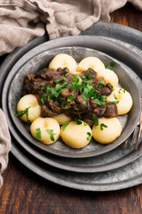Potato dumplings and forest mushroom sauce