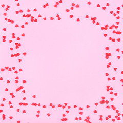 Pink background with red hearts. Valentine's day concept.