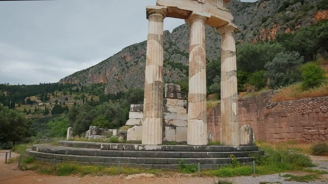 Tholos with Doric columns at the Athena Pronoia temple ruins in Delphi, Greece