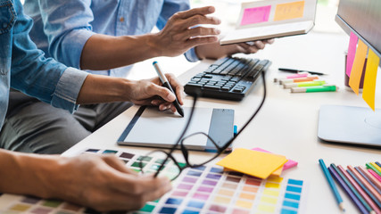 Professional Creative architect graphic desiner occupation choosing the Color pantone palette...