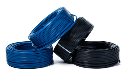 Coils of black and blue cable isolated on white background