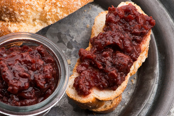Sweet bread (challah) with cherry jam