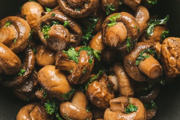 Tasty cooked mushrooms as background