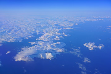 Aerial view of the Labrador Newfoundland area near Nutak and Nain, Canada, covered with ice and snow in winter